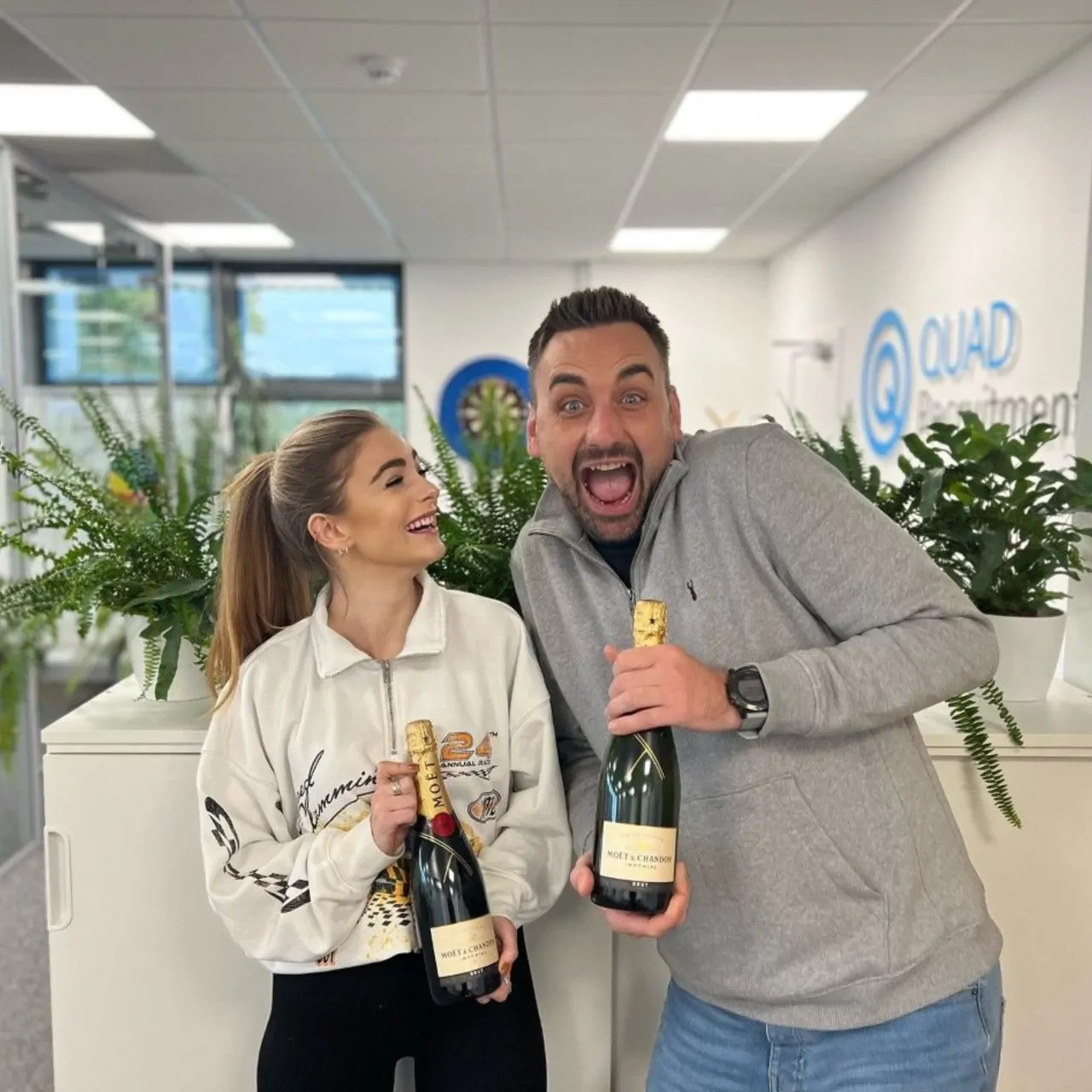 Quad employees gifted champagne